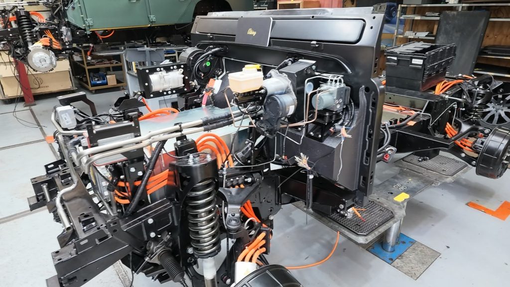 Stripped Land Rover Defender with the electronics exposed